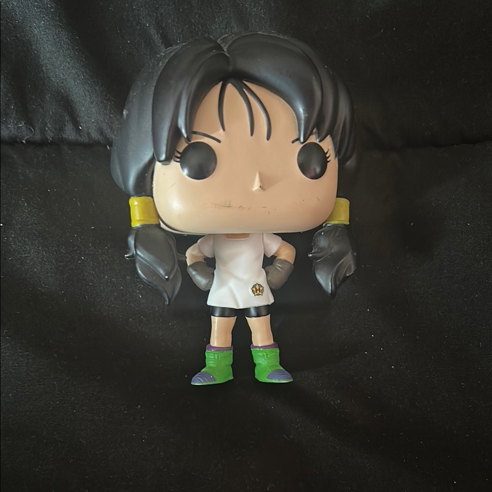 Funko Pop Figure with White Dress and Green Socks